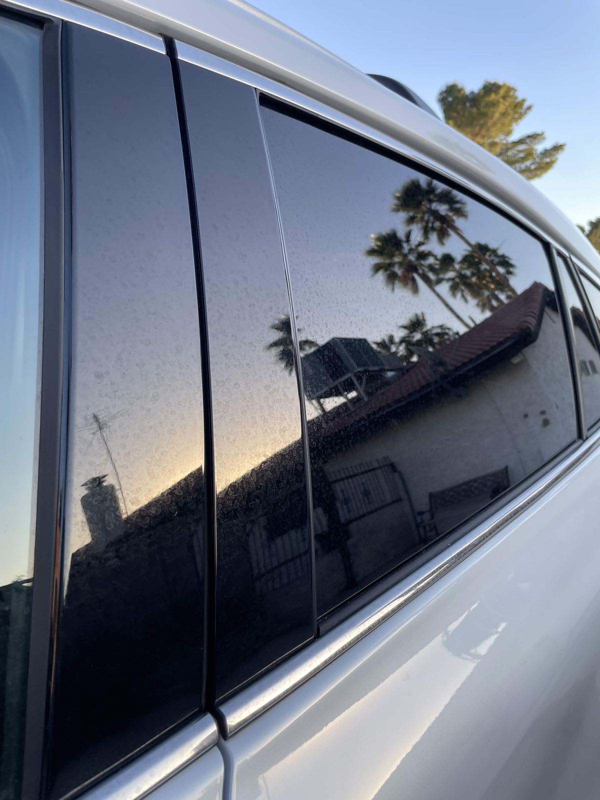 Window trim and glass before mobile detailing in Las Vegas